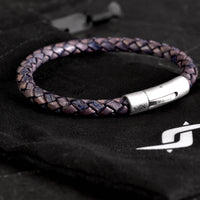 Joe Genuine Leather Bracelet in Antique navy, product picture bracelet on pouch bag